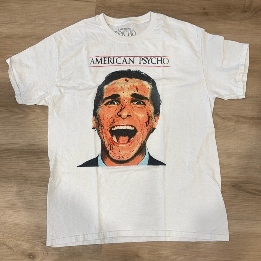 Men’s size Medium white Graphic Tee with American Psycho picture